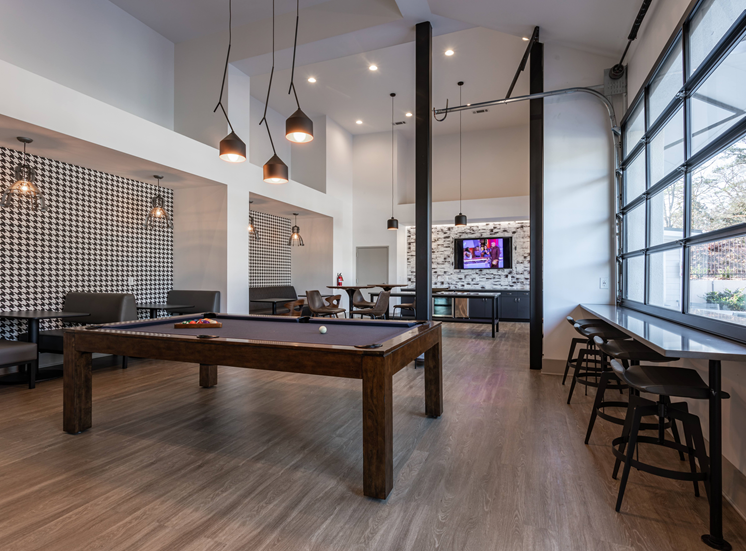 Clubhouse, light fixtures, windows, and tv